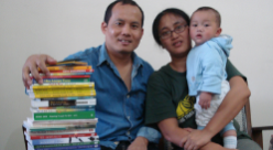 Pastor and family with home library in Far East